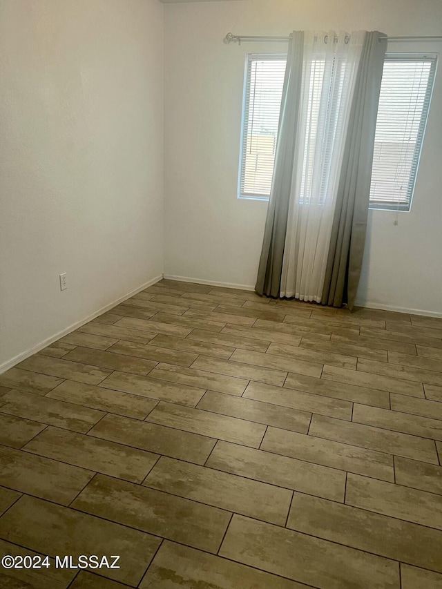 empty room with light wood-type flooring