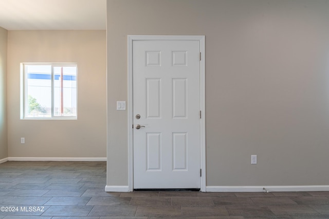 empty room featuring dark hardwood / wood-style floors