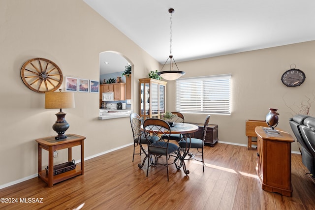 dining area with light hardwood / wood-style floors