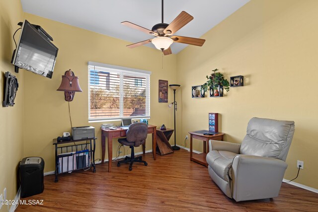 office featuring dark hardwood / wood-style floors and ceiling fan