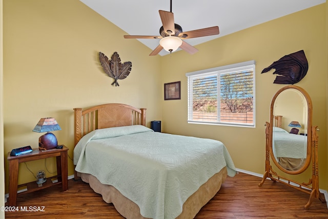 bedroom with wood-type flooring and ceiling fan