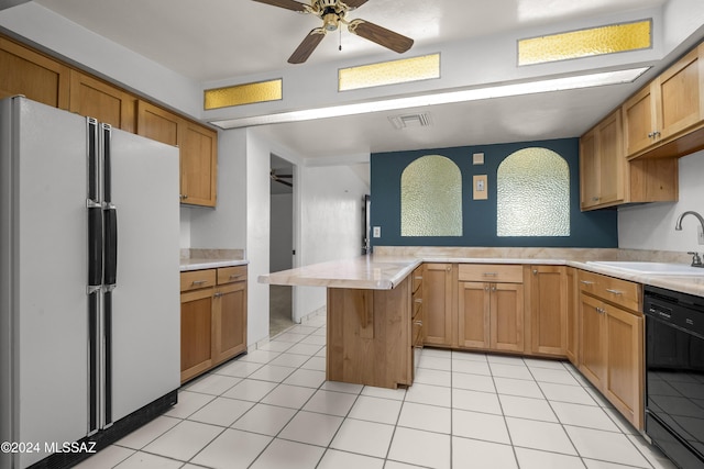 kitchen with kitchen peninsula, ceiling fan, sink, black dishwasher, and white fridge