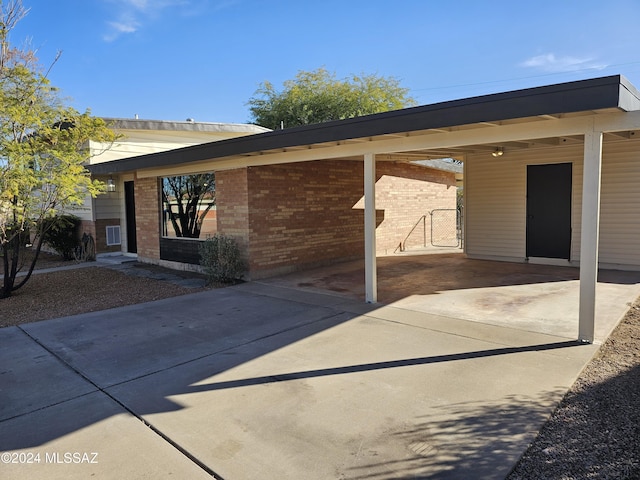 view of patio featuring a carport