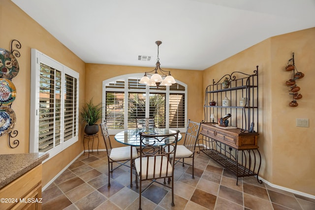 dining room with an inviting chandelier