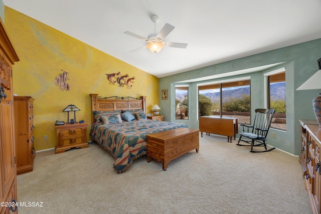 bedroom featuring ceiling fan and light colored carpet