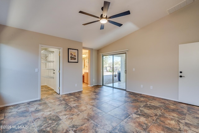 spare room with ceiling fan and lofted ceiling