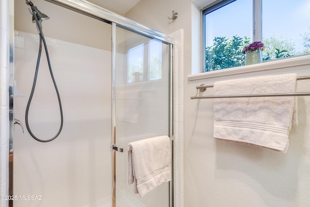 bathroom with an enclosed shower