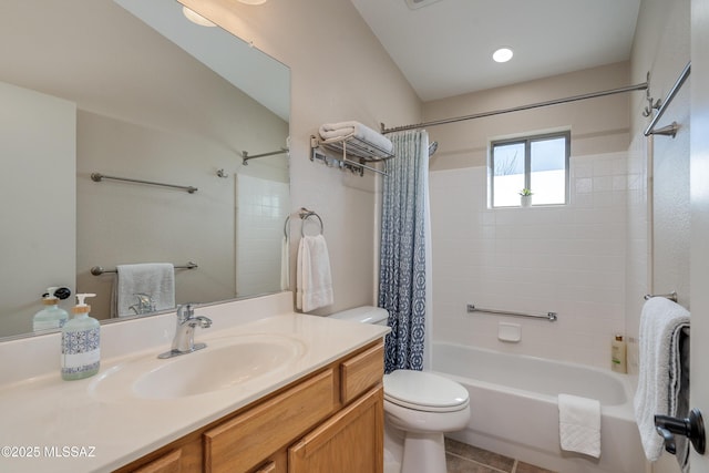 full bathroom featuring tile patterned flooring, vanity, toilet, and shower / bathtub combination with curtain