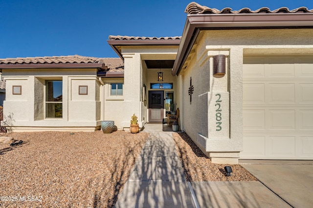 property entrance featuring a garage