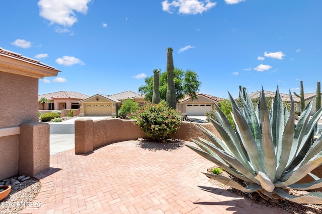 view of patio featuring a garage