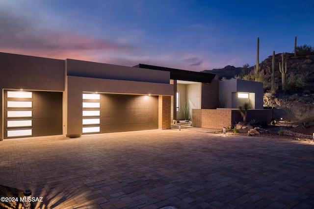 view of front of property with a garage