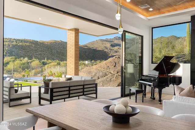 interior space featuring a mountain view and wood ceiling