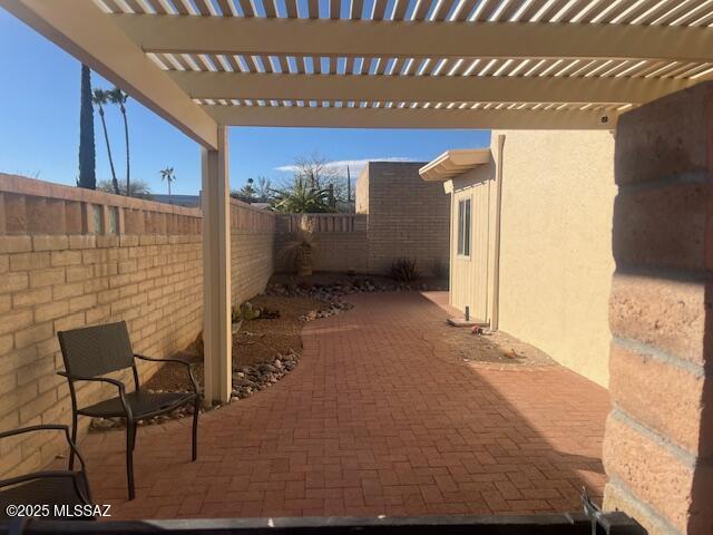 view of patio / terrace featuring a pergola