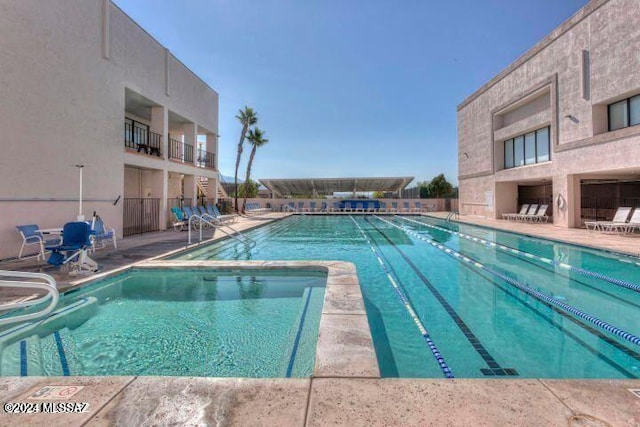 view of pool featuring a patio area