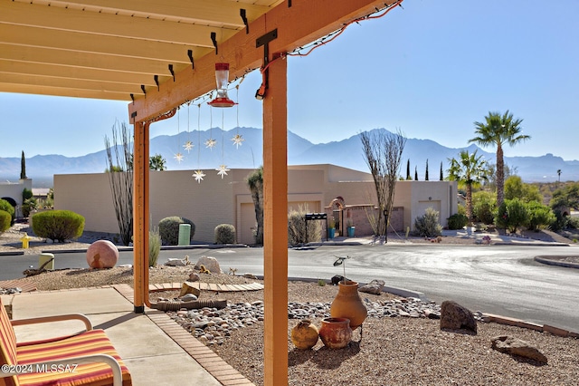 view of patio with a mountain view