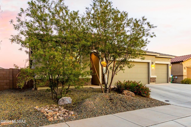 view of front of house with a garage