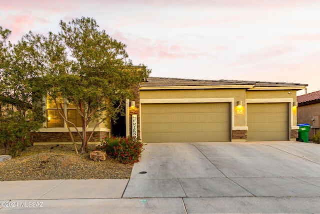 prairie-style home with a garage