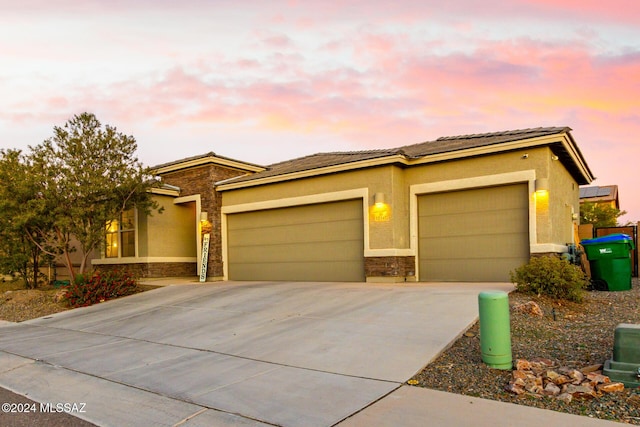 view of front of home featuring a garage