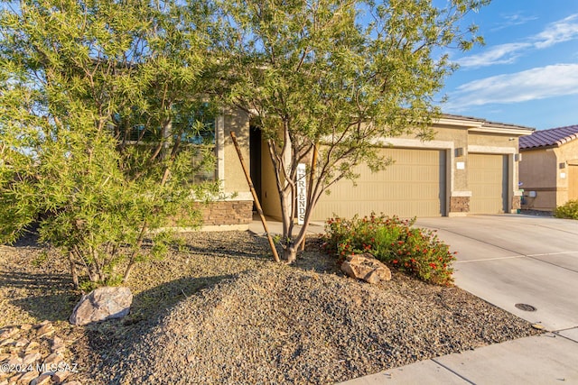 view of front of property featuring a garage