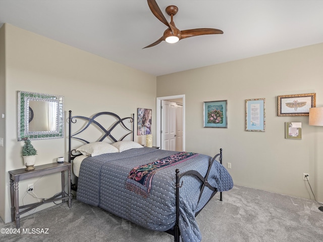 bedroom with ceiling fan and carpet