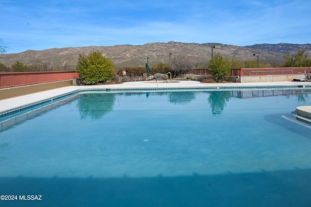 view of pool with a mountain view