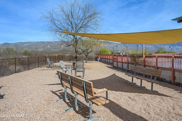 view of community with a mountain view