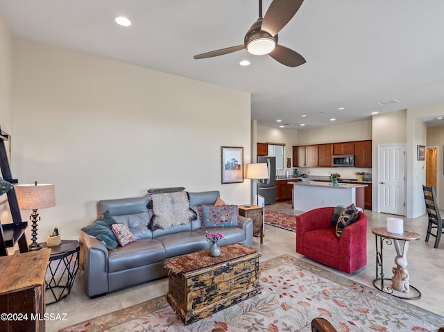 living room featuring ceiling fan