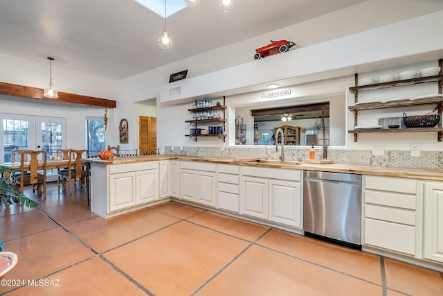 kitchen with a sink, french doors, dishwasher, open shelves, and pendant lighting