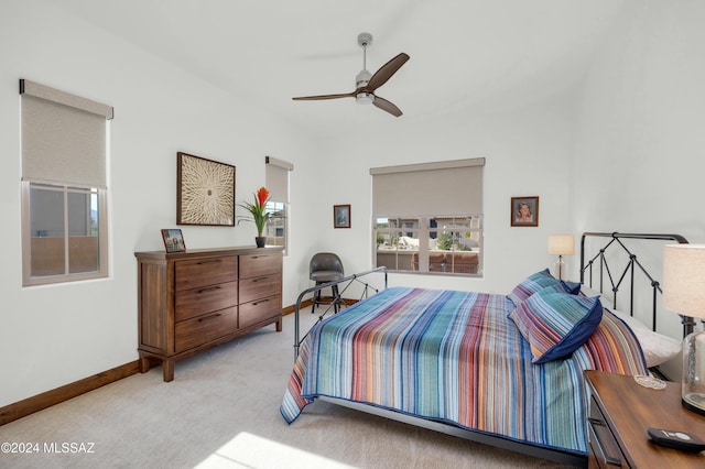 36513 S Cactus Ln, Tucson, AZ 85739 - bedroom featuring a ceiling fan, light colored carpet, and baseboards