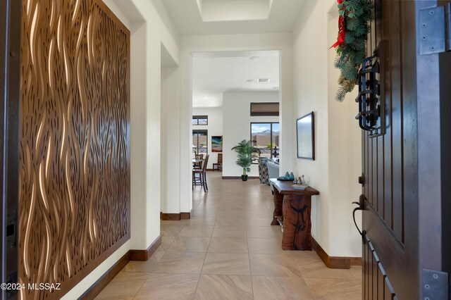 entrance foyer with light tile patterned floors