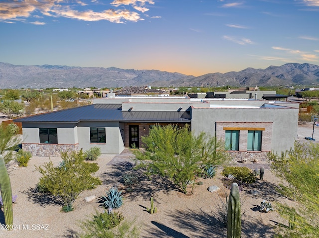 exterior space featuring a mountain view