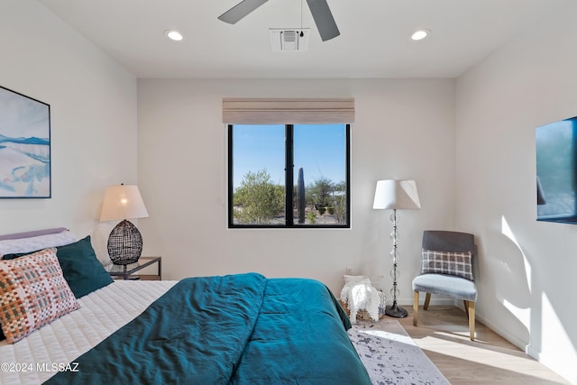 bedroom with visible vents, baseboards, ceiling fan, wood finished floors, and recessed lighting