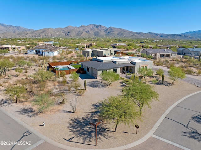 drone / aerial view featuring a mountain view