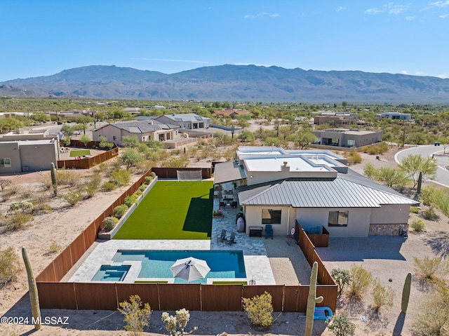 bird's eye view with a mountain view