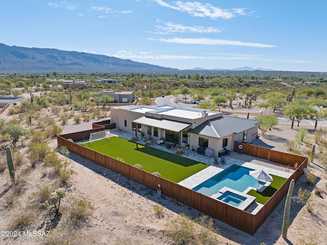 bird's eye view with a mountain view