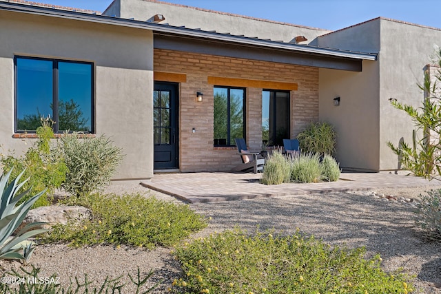 rear view of property with a patio