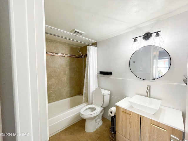 full bathroom with vanity, toilet, and shower / bathtub combination with curtain