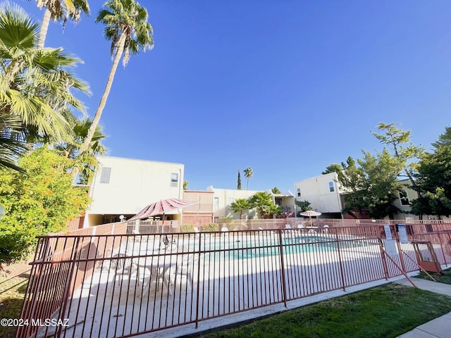 view of swimming pool with a patio