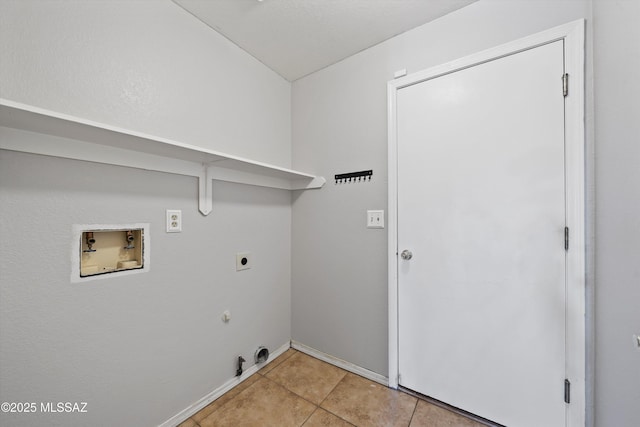 laundry room with laundry area, gas dryer hookup, hookup for a washing machine, hookup for an electric dryer, and light tile patterned flooring