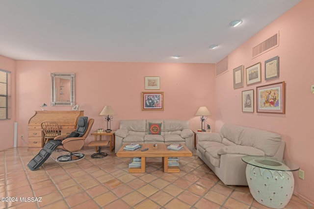 living room with light tile patterned floors