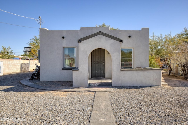 view of pueblo revival-style home