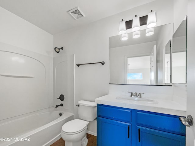 full bathroom featuring vanity, shower / bathing tub combination, and toilet