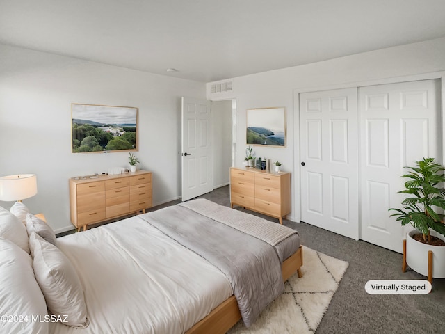 carpeted bedroom featuring a closet