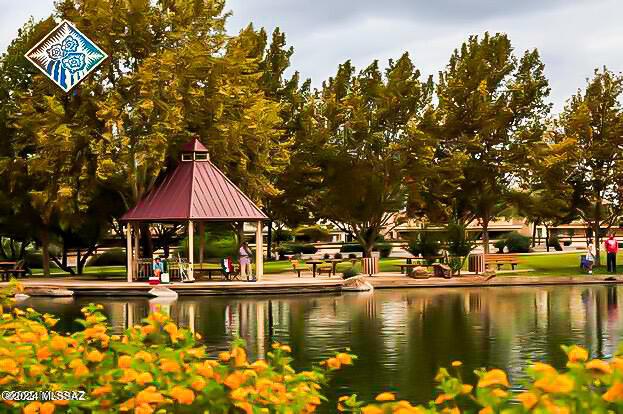 view of community featuring a gazebo and a water view