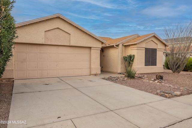 ranch-style house with a garage