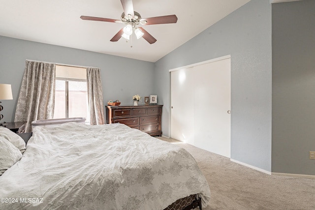 bedroom featuring light colored carpet, ceiling fan, and lofted ceiling