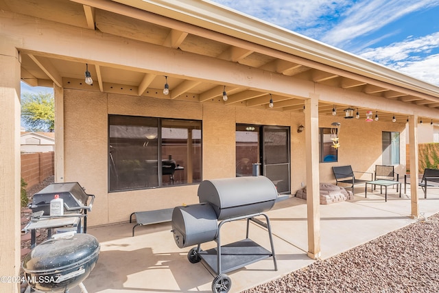 view of patio featuring a grill