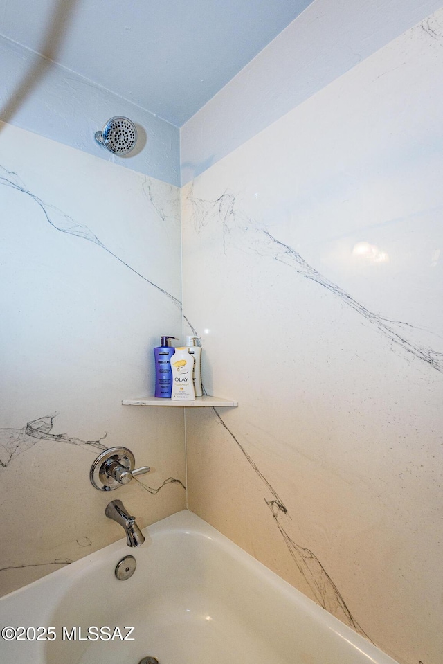 bathroom featuring bathing tub / shower combination