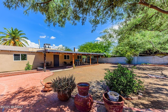 rear view of house with a patio area