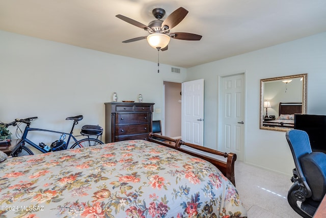 carpeted bedroom featuring ceiling fan